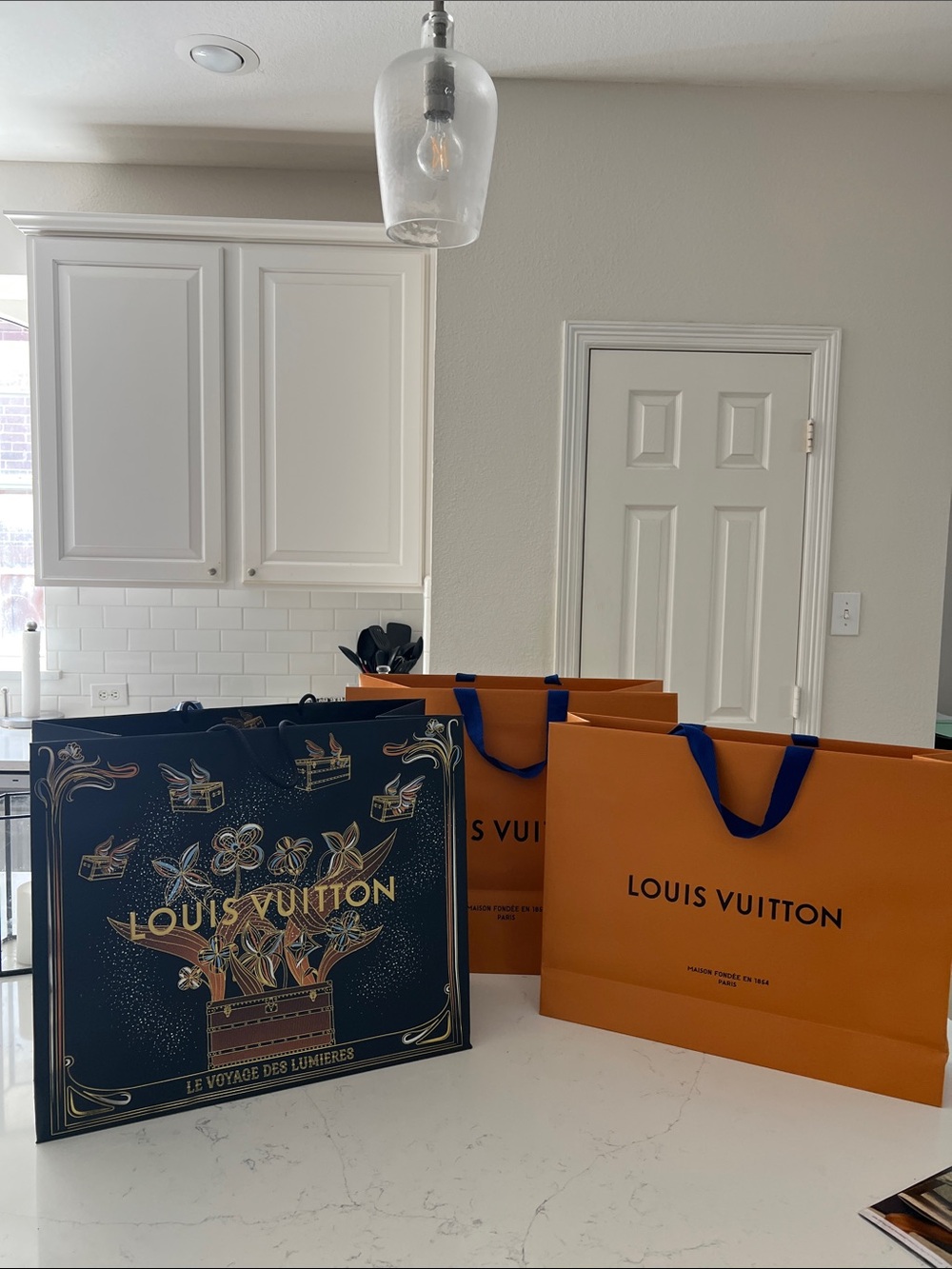 Louis Vuitton Shopping Bags - Picture 12 of 16